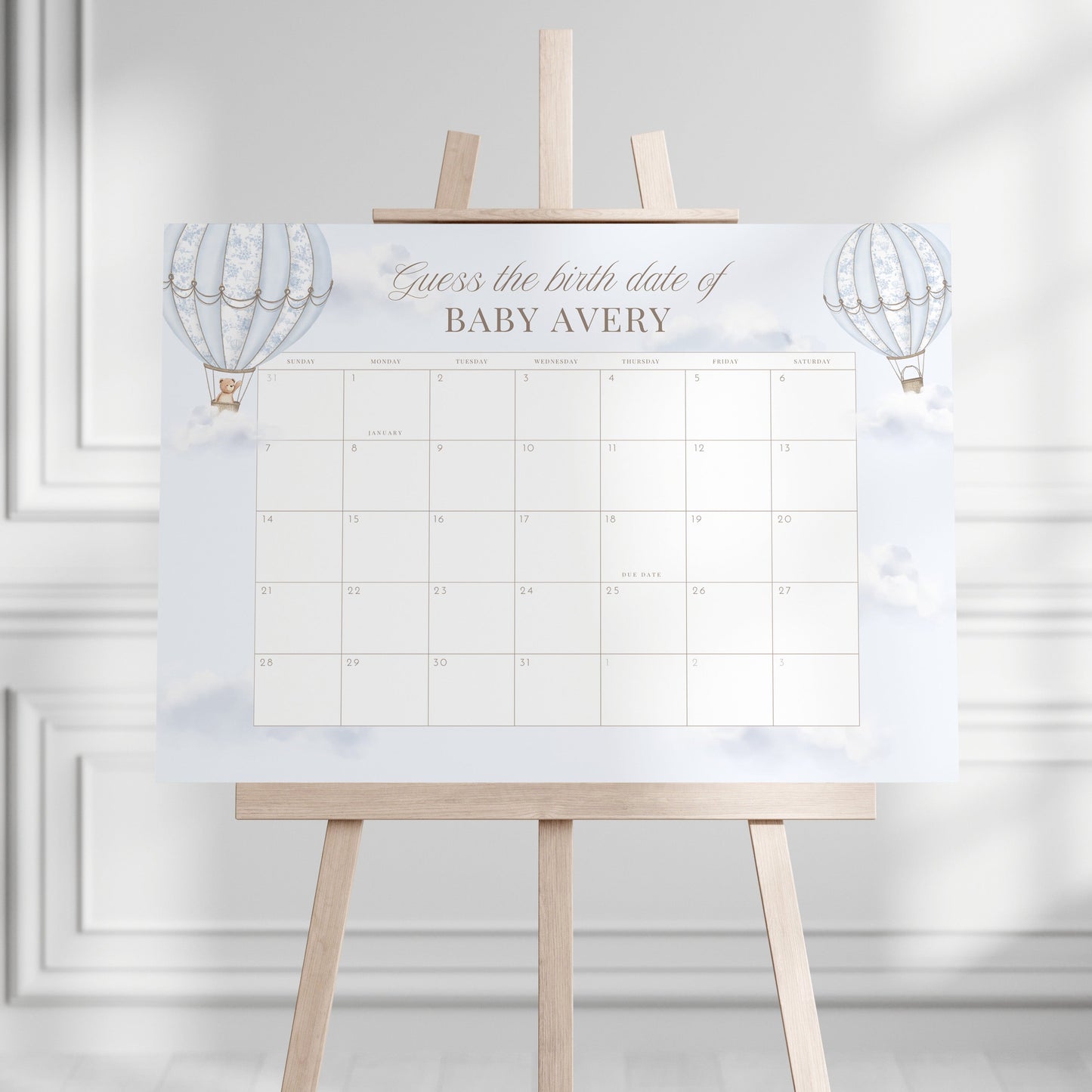 Guess the Birth Date Calendar on a stand against a white wall
