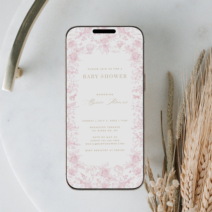 Phone with floral design case on a marble surface with dried plants