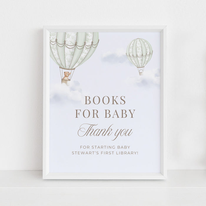 Framed Table Sign with hot air balloons and text on a white wall