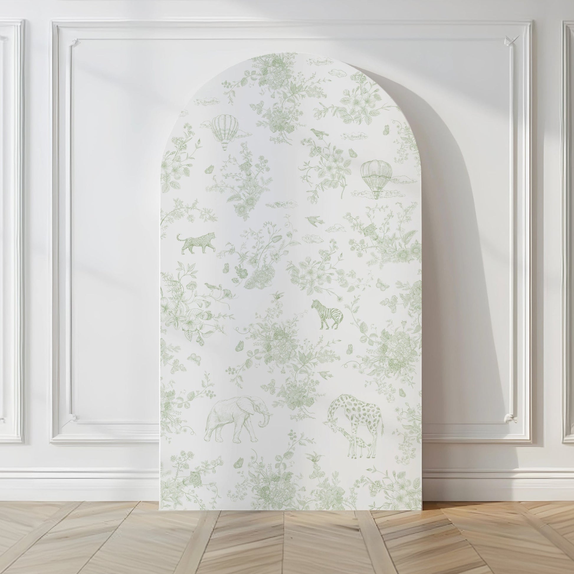 Decorative Backdrop with floral design on a wall with white paneling and wooden floor.
